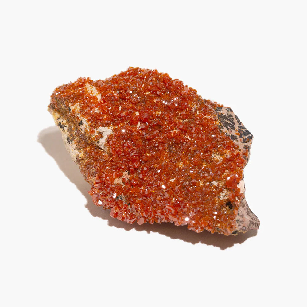 Close up of red hexagonal vanadinite crystals